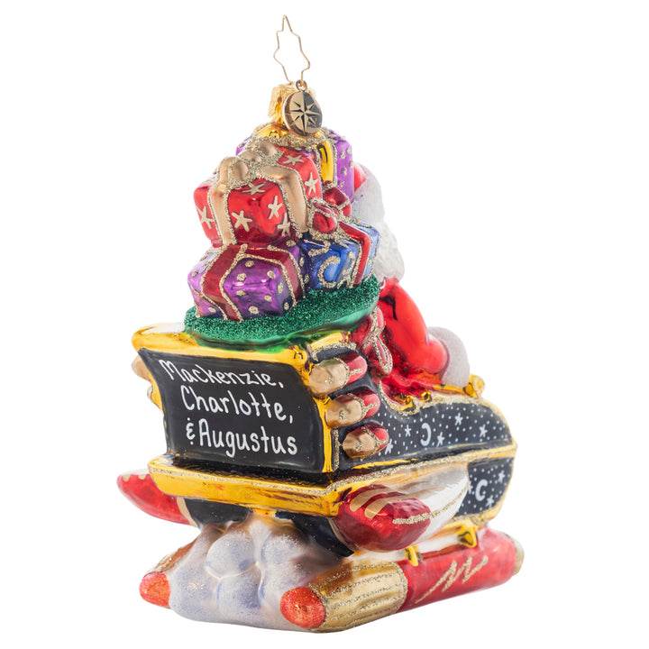 Back - Ornament Description - Starry Night Ride: It's a bird! It's a plane! No, it's Santa Claus! Santa's sleigh has gotten a serious upgrade. With a ride like that, this holiday season is bound to be out of this world! Note: Please allow approximately one month (on top of shipping time) for our elves to personalize your ornament.