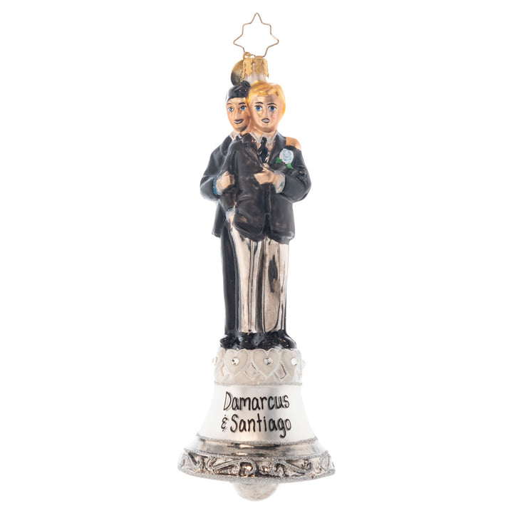 Ornament Description - Dedicated Devotion: These two gentlemen are dedicated to each other and ready to start the first day of the rest of their lives! Ring the bell, celebrating this loving couple and sending them on their new path together! Note: Please allow approximately one month (on top of shipping time) for our elves to personalize your ornament.