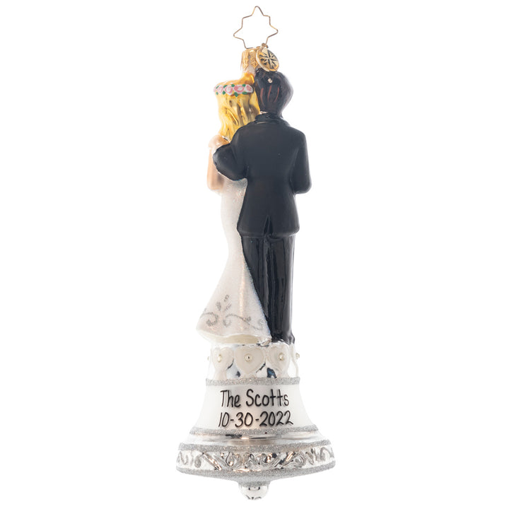 Back - The flowers have been tossed, the wedding bells have rung! This couple is finally hitched, and the good times have only just begun. Note: Please allow approximately one month (on top of shipping time) for our elves to personalize your ornament.