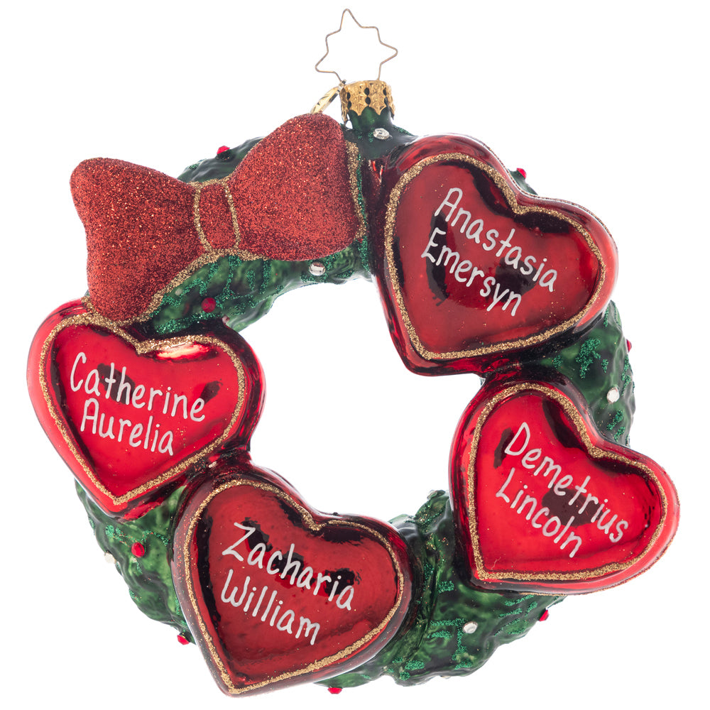 Ornament Description - Our Family Wreath Personalized: Family makes the holidays complete! This classic wreath will be a treasured memento for years to come. Note: Please allow approximately one month (on top of shipping time) for our elves to personalize your ornament.
