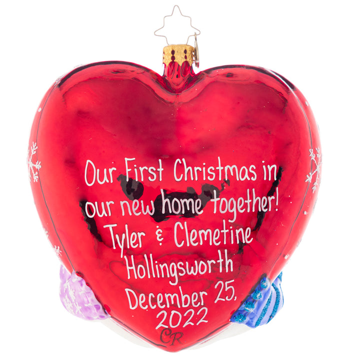 Back - Ornament Description - A Frosty First Christmas Personalized: They may be made of snow, but they have got their love to keep them warm! This heart-shaped ornament celebrates new love and the thrill of a first holiday spent together. Note: Please allow approximately one month (on top of shipping time) for our elves to personalize your ornament.