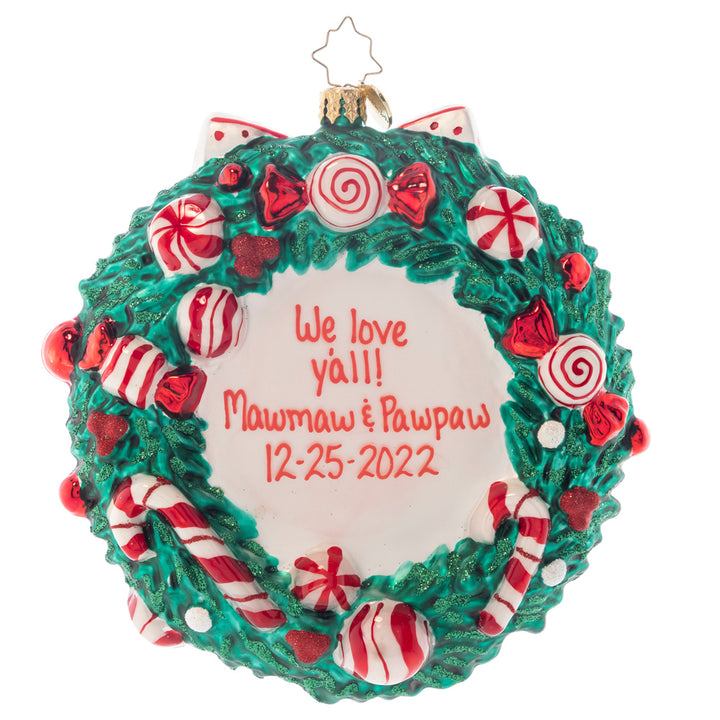 Back - Ornament Description - Candy Cane Delight Personalized: A thoughtful, well-rounded holiday treat; a ring of warm wishes and peppermints so sweet! This commemorative wreath is the perfect way to celebrate the sweetest season of them all! Note: Please allow approximately one month (on top of shipping time) for our elves to personalize your ornament.