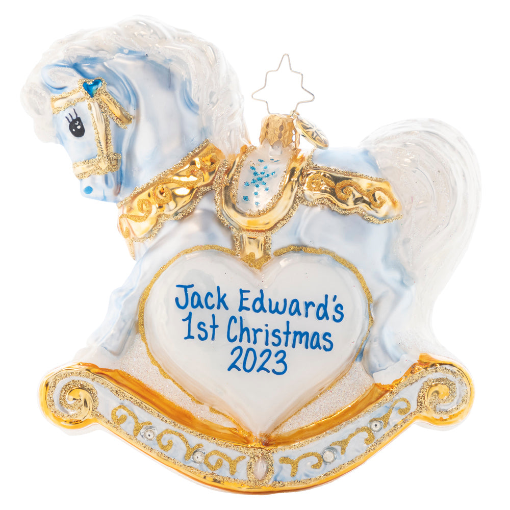 Ornament Description - Baby's First Christmas Foal Personalized: It is a precious gift, a bundle of joy -- a darling bouncing baby boy! Commemorate your new arrival with this keepsake rocking horse in baby blue. Note: Please allow approximately one month (on top of shipping time) for our elves to personalize your ornament.