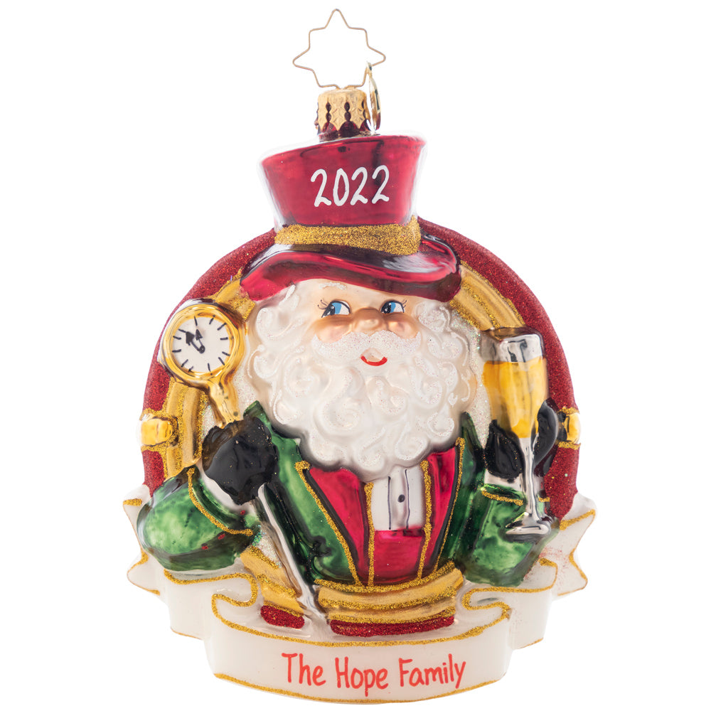 Ornament Description - Champagne Dreams Peronalized: Pop the bubbly! Santa has a champagne glass ready to welcome 2022. Cheers to a new year! Note: Please allow approximately one month (on top of shipping time) for our elves to personalize your ornament.