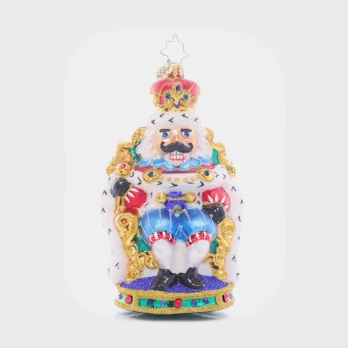Video - Ornament Description - At Home on the Throne: The nutcracker king is keeping court at the candy castle, sitting comfortably in a gilded throne. Add a regal touch to your tree with this stunning piece!