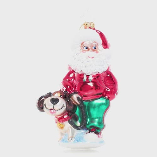 Video - Ornament Description - Santa's Best Friend: Just call him Santa Paws! Old Saint Nick shows his soft spot for four-legged friends on a walk with his canine companion. This video shows the ornament spinning slowly. 