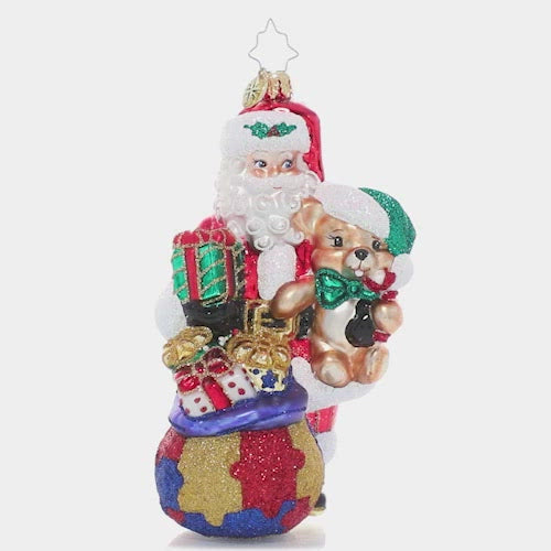 Video - Ornament Design - Delivering Awareness: Santa's sack is packed with presents galore, spreading Christmas cheer and support for a cause close to his heart; Autism awareness. A percentage of the sales from this ornament will benefit a charity that raises Autism awareness. The video shows this ornament slowly spinning. 
