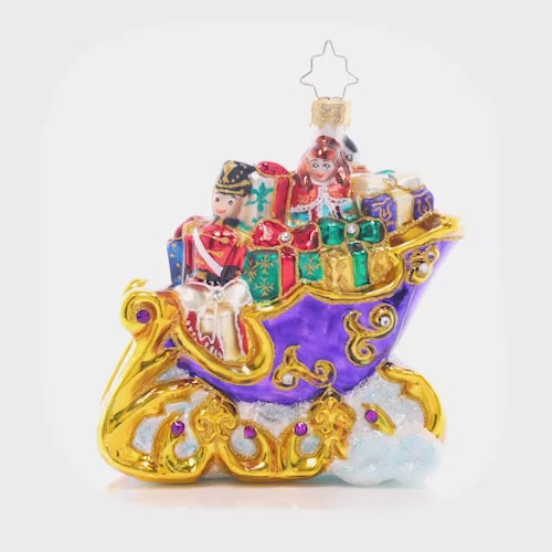 Video - Ornament Description - Sleighful of Gifts: This stocked-up sleigh looks like it's floating atop fluffy cloud – on its way to spread joy to all the good little girls and boys this Christmas, no doubt! This video shows the ornament spinning slowly. 