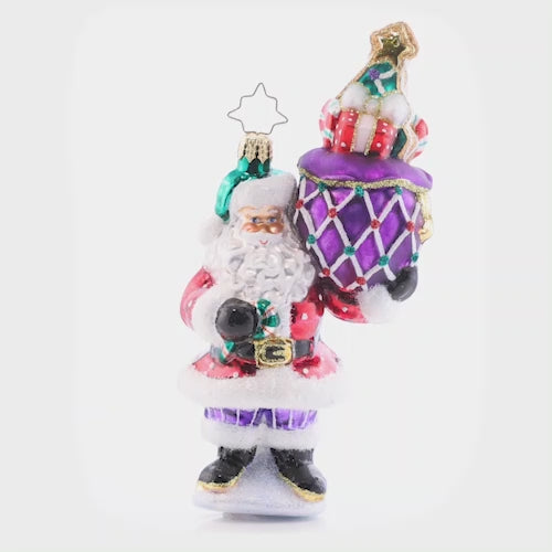 Video - Ornament Description - Sweet Treats Santa: Santa is feeling extra sweet, with lots of sugary treats. He'll make sure your tummy is filled with tasty candies, until your Christmas sweet tooth is completely satisfied! This video shows the ornament spinning slowly. 