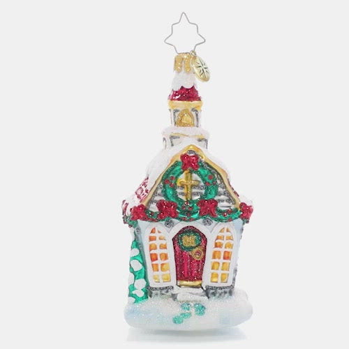Video - Ornament Description - Christmas Tradition Chapel: Decorated for Christmas and covered in fresh snow, this tiny town chapel welcomes one and all home for the holidays. After all, no celebration is complete without family and friends to share it with!