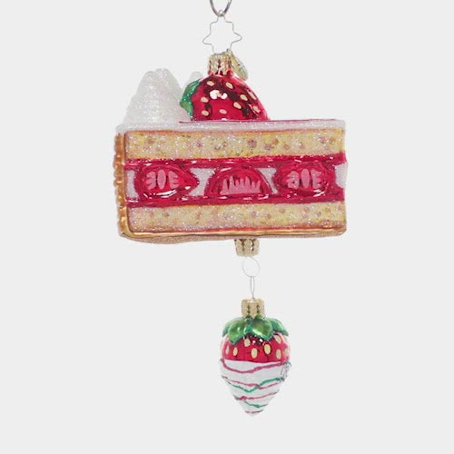 Video - Ornament Description - Divine Dessert: Strawberries and cream-a dream! Sweet berries and whipped cream adorn a delightful sponge cake, with one juicy berry dangling below. It looks good enough to eat!