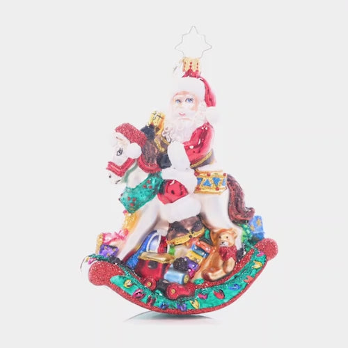 Video - Ornament Description - Rockin' Christmas Santa: Santa sure is rockin' right onto the Christmas tree with this charming toy horse. After all, he has to test the toys before gifting them to the good little girls and boys! This video shows the ornament spinning slowly. 