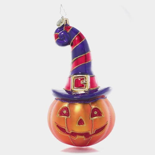 Video - Ornament Description - Bewitching Jack-o-Lantern: Boo! This Jack-O-Lantern is getting into the spirit of spooky season, grinning from beneath the brim of his favorite witchy hat.