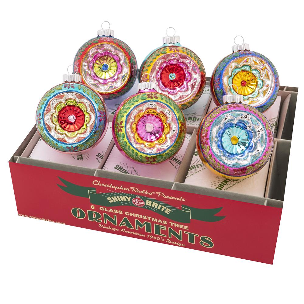 Ornaments - Description: Christmas Confetti 6 Count 3.25" Decorated Reflector Rounds - This collection of dazzling dimensional rounds showcases vintage-inspired shapes, retro color combinations, and sparkling floral motifs for a pop of major Christmas nostalgia!