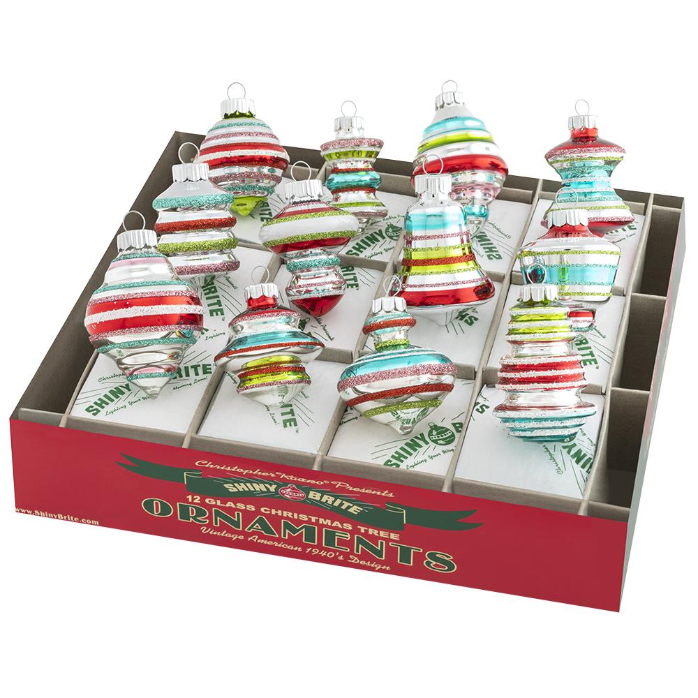 Ornament Description - Festive Fete 12 Count 1.75" Decorated Shapes: Inspired by the unique shapes and colors of Christmas ornaments of yesteryear, this set of twelve is a nostalgic nod to the cherished holiday memories we hold dear.
