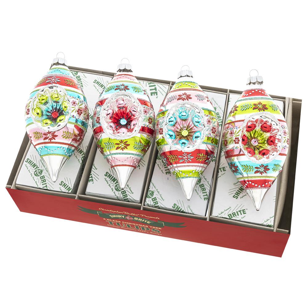 Ornament Set Description - Festive Fete 4 Count 7" Reflector Tulips: This set of four ornate glass tulips shine in bright vintage-inspired colors and designs. Add them to your ornament collection for a pop of statement-making sparkle!