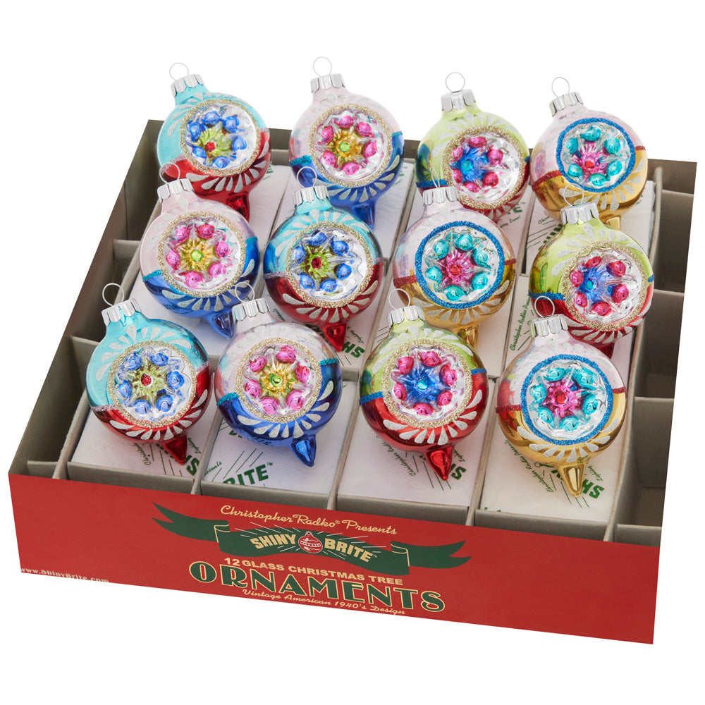 Boxed Set Ornament Description - Christmas Confetti 12 Count 1.75" Decorated Reflector Rounds: Add bold and bright holiday style to your tree with these beautiful, vintage-inspired glass rounds.