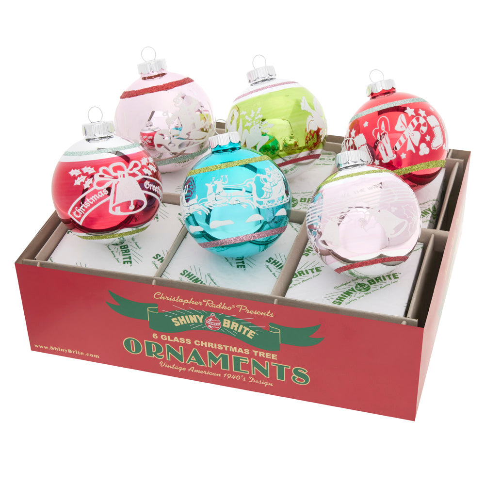 Ornament Set Description -Festive Fete 6 Count 3.25" Signature Flocked Rounds: Snow-white flocked holiday scenes stand out against the shining backdrop of these beautiful glass ornaments! This set evokes fond memories of Christmas nostalgia.