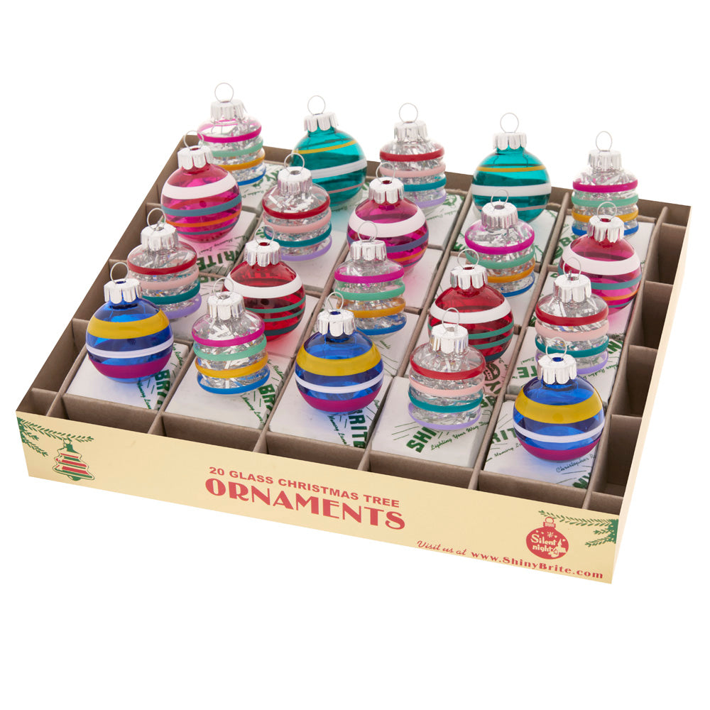 Ornament Description - Vivid Vintage 20 Count 1.25" Shapes & Rounds: An assortment of vintage cylinders and rounds shine bright in cheerful combinations or red, blue, pink, and yellow glass. This 20-count set adds plenty of pop to your tree!