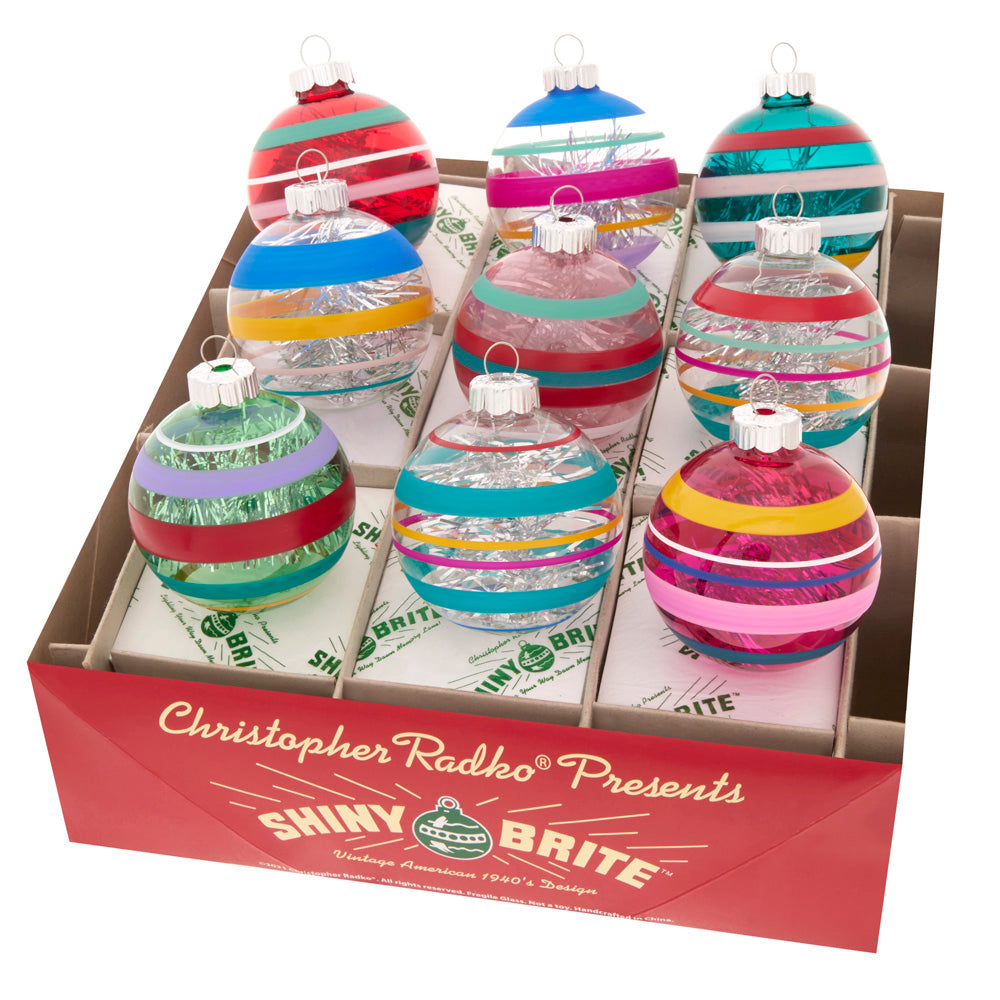 Ornament Description - Vivid Vintage 9 Count 2.5" Decorated Rounds: Boldly-colored stripes stand out among a shining glass background, creating a beautiful arrangement of ornaments in this nine-piece set.
