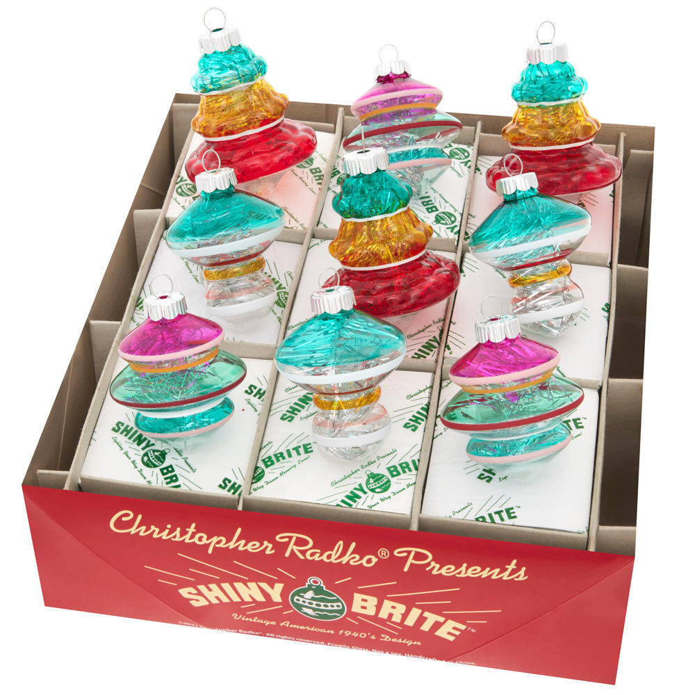 Ornament Set Description - Vivid Vintage 9 Count 2.5" Shapes: Fuchsia, turquoise, and red hues accentuate the tree shape of these funky, festive glass ornaments.