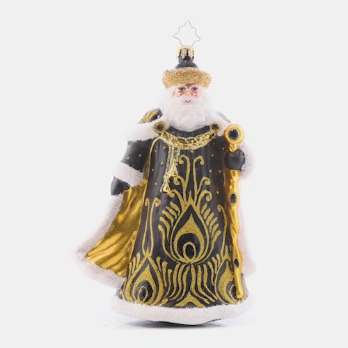 Video - Ornament Description - Ebony Elegance Santa: A luxurious peacock design adorns this elegant Santa who enjoys the finer things in life. This fancy Santas is sure to spruce up any tree with decadent ebony and lavish gold hues! The video shows this ornament slowly spinning