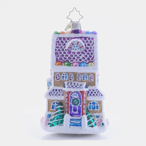 Video - Ornament Description - Sweet Chalet: Charmingly dusted with icing snow drifts and colorful gumdrops, this magnificent tri-level treat is the sweetest gingerbread house on the block! This video shows the ornament spinning slowly. 