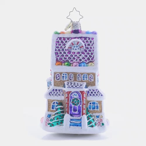 Video - Ornament Description - Sweet Chalet: Charmingly dusted with icing snow drifts and colorful gumdrops, this magnificent tri-level treat is the sweetest gingerbread house on the block! This video shows the ornament spinning slowly. 