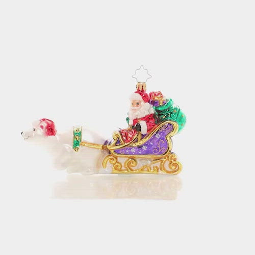 Video - Ornament Description - Polar Bear Powered: Tally ho! Santa has given his reindeer the day off, hitching his magic sleigh to a friendly polar bear for a joy ride in the snow. This video shows the ornament spinning slowly. 
