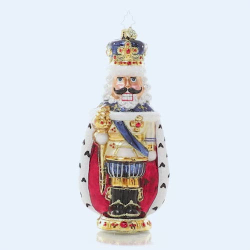 Video - Ornament Description - Nutcracking Royalty: Get the holiday season cracking this year with this jolly royal nutcracker. From behind, his regal robe wraps around his feet giving him a shape reminiscent of a nut himself! This video shows the ornament spinning slowly.