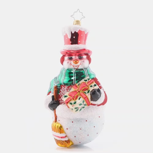 Video - Ornament Description - Christmas Joy Snowman: With rosy snow-cheeks aglow with Christmas cheer, this top-hat snowman is sweeping and grinning ear-to-ear!