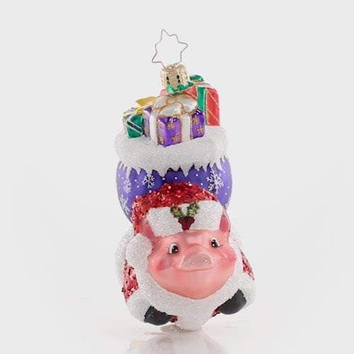 Video - Ornament Description - When Pigs Fly!: This piggie has got serious sty-le! He is reaching for the sky and proving that with the help of a little Christmas magic, nothing is impossible! This video shows the ornament spinning slowly. 