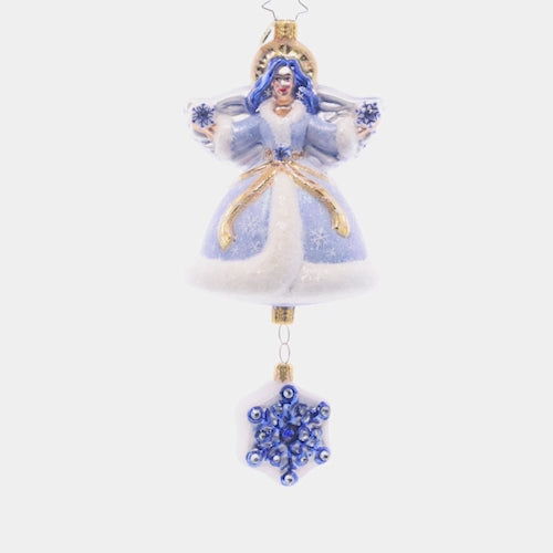 Video - Ornament Description - Sapphire Snow Angel: This stunning snow angel is dressed in an icy, shimmering saphhire robe. She shines as a bright beacon of hope through the cold winter night. This video shows the ornament spinning slowly. 