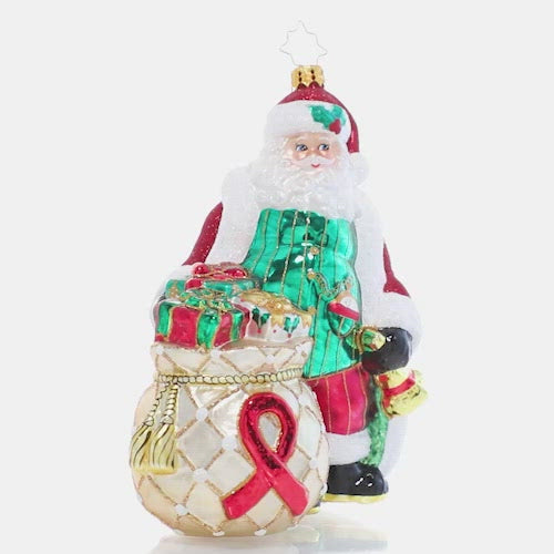 Video - Ornament Description - AIDS Awareness Santa: Santa knows that the Christmas season is nothing without an open heart and love for our fellow man – he's spreading not just Christmas cheer, but also compassion and awareness for AIDS. A percentage of the sales from this ornament will benefit AIDS awareness.