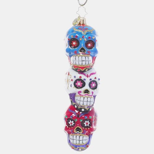 Video - Ornament Description - Spooky Sugar Skulls: Triple the tricks, triple the treats! Trim your Halloween tree with this trio of colorful stacked sugar skulls. This video shows the ornament spinning slowly. 