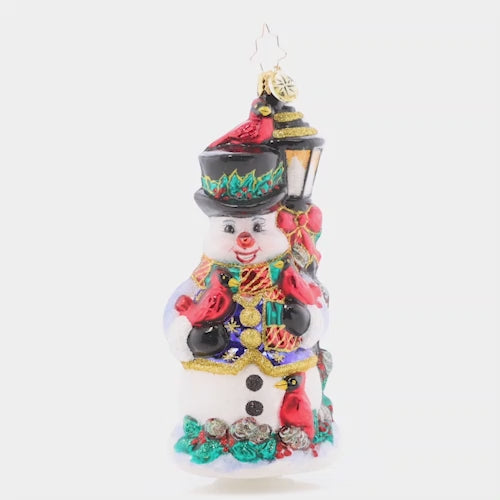 Video - Ornament Description - Feathered Friends Snowman: Birds of a feather flock together! This smiling snowman is a delighfully darling perch for Christmas-red cardinals.