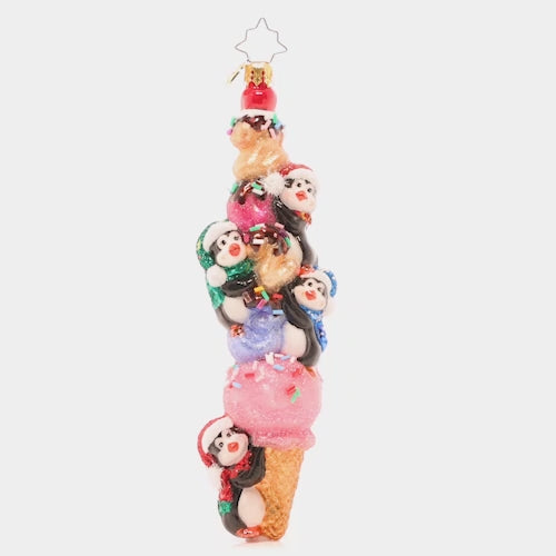 Video - Ornament Description - 2023 Scoops: I scream, you scream, we all scream for ice cream! Four playful penguins pile atop this delectable dated cone. It looks like 2023 will be a pretty sweet year!