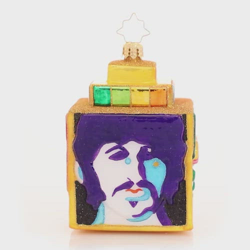 Video - Ornament Description - Sea of Science Cube: The Beatles have found themselves in another groovy underwater realm, filled with so many wonders. They'll continue on their journey to Pepperland, but not before singing a Northern song and getting a little colorful. This video shows the ornament spinning slowly. 