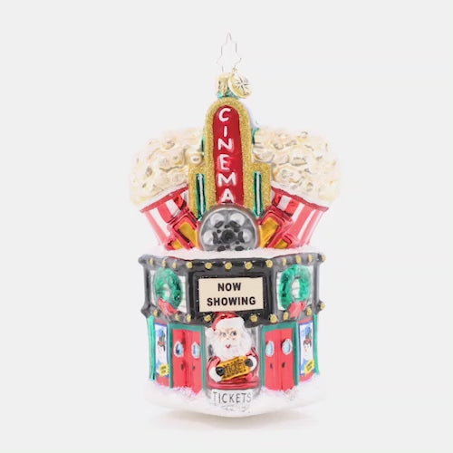 Video - Ornament Description - Marvelous Marquee: Lights, camera, popcorn! Enjoy the classic charm of a cinema this Christmas with a theater-themed ornament. Santa is ready for the big screen! This video shows the ornament spinning slowly. 