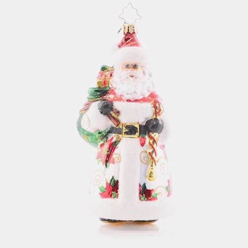 Video - Ornament Description - Mara's Merry Claus: Poinsettias pop against Santa's sumptuous snow-white robe on this darling ornament, designed by our very own sales team member, Mara Kalnins. This video shows the ornament spinning slowly. 