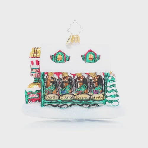Video - Ornament Description - Santa's Stables: Only the best for Santa's trusted reindeer team! He's made sure his friends live the high life in these cozy Christmas stables. This video shows the ornament spinning slowly. 