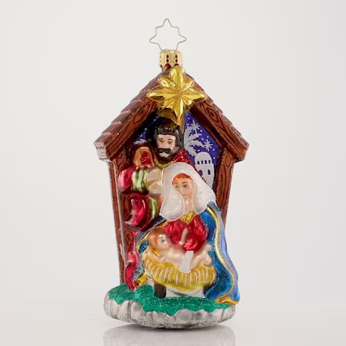 Video - Ornament Description - Miracle in the Manger: Let heaven and nature sing! Mary and Joseph gaze lovingly at baby Jesus as he sleeps peacefully in the Bethlehem manger where he has just been declared the newborn king. The video shows the ornament spinning slowly. 