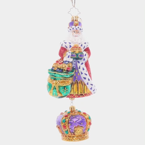 Video - Ornament Description - The King Of Christmas: With his luxurious, fur-lined robe, bag of golden gifts, and carefully-bejeweled crown, this royal Santa is sure to be the king of your Christmas tree. This special ornament has been hand-picked by the Radko team to be part of the Limited Edition collection. This video shows the ornament spinning slowly. 
