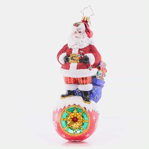 Video - Ornament Description - On Top of it Santa: With his bustling, busy holiday schedule, Santa must be on the ball when delivering his gifts. Not to worry, though, he's been doing this for a long time! This video shows the ornament slowly spinning. 