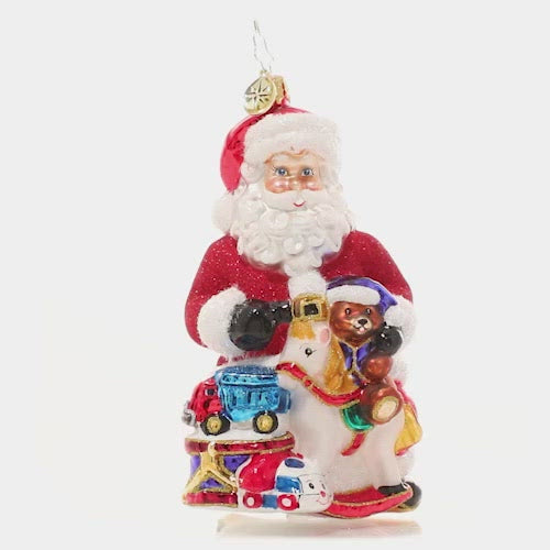 Video - Ornament Description - Santa's Ton Of Toys: Santa looks perfectly prepared with his massive pile of toys for good little girls and boys! This traditional Santa is sure to delight! This video shows the ornament spinning slowly.