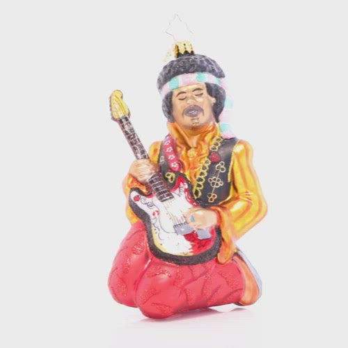 Video - Ornament Description - Jimi Hendrix™ Solo: Far out! Pay tribute to the godfather of psychedelic rock n' roll with this piece that captures Jimi Hendrix in one of his iconic guitar solos. You can practically hear "Purple Haze"! This video shows the ornament slowly spinning. 