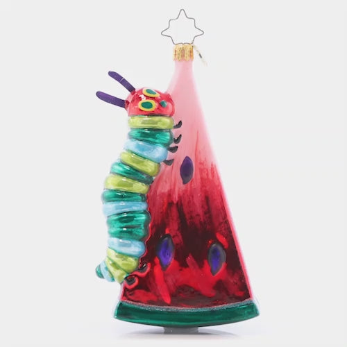 Video - Ornament Description - Caterpillar Cravings: The Very Hungry Caterpillar is no different than us… It's impossible to resist the temptation of a juicy watermelon. Eric Carle's beloved character climbs his meal in persistent search for more goodies in this shimmery ornament.