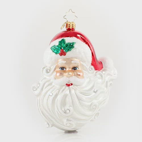 Video - Ornament Description - Jolly With a Dash of Holly: Hello Handsome! From the snow-white beard to his rosy cheeks and twinkling blue eyes, Santa sure is looking his best this year! This video shows the ornament slowly spinning. 