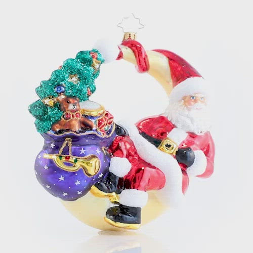 Video - Ornament Description - Over the Moon for Christman: Who knew that the man in the moon is actually Saint Nick himself? Santa takes a lunar lounge break on this festive crescent moon and enjoys the view from above. This video shows the ornament spinning slowly. 