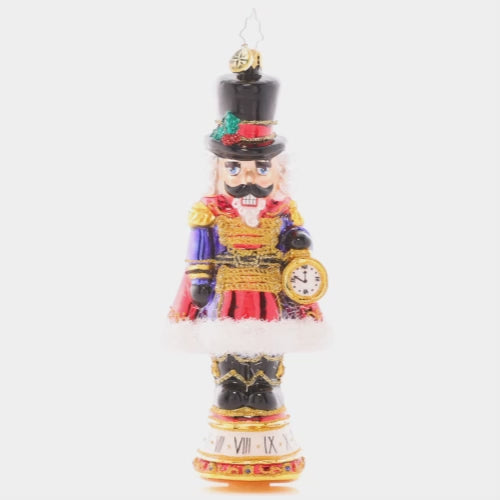 Video - Ornament Description - Countdown to Christmas: Keeping time with his golden pocket watch, this stately nutcracker is counting down the minutes until Christmas Day!